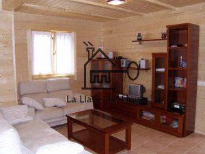 comedor de interior de una casa de madera de La Llave del Hogar