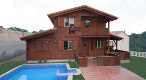 Casa de madera modelo Peñalara 180 con piscina